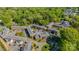 Aerial view of a well maintained apartment complex surrounded by lush trees and ample parking at 862 Mcalway Rd, Charlotte, NC 28211