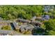 Aerial view of a well maintained apartment complex surrounded by lush trees and ample parking at 862 Mcalway Rd, Charlotte, NC 28211