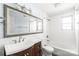 Bathroom featuring vanity with sink, toilet, tub and subway tile surround at 862 Mcalway Rd, Charlotte, NC 28211