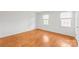 Bedroom with hardwood floors and two large windows at 862 Mcalway Rd, Charlotte, NC 28211