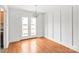 Cozy dining area with hardwood floors and pendant lighting fixture at 862 Mcalway Rd, Charlotte, NC 28211