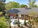 The backyard features a stone patio with room for grilling and outdoor seating at 961 Confederate Ave, Salisbury, NC 28144