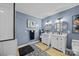 A stylish bathroom featuring a walk-in shower, and dual vanities at 961 Confederate Ave, Salisbury, NC 28144