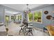Cozy breakfast nook with a unique light fixture, views of the backyard, and casual seating at 961 Confederate Ave, Salisbury, NC 28144