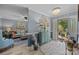 Elegant foyer with stylish decor, a chandelier, and a view into the living room with hardwood floors at 961 Confederate Ave, Salisbury, NC 28144