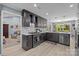 Well-appointed kitchen with dark cabinets, granite countertops, and modern appliances for cooking convenience at 961 Confederate Ave, Salisbury, NC 28144