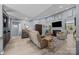 Cozy living room featuring plush seating, a fireplace, and neutral decor for a relaxing atmosphere at 961 Confederate Ave, Salisbury, NC 28144