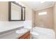 Bathroom featuring a vanity sink, storage cabinet, and tiled bathtub shower combo at 104 Willetta Dr, Charlotte, NC 28217