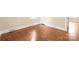 Bedroom featuring hardwood floors, baseboard trim and a closet at 104 Willetta Dr, Charlotte, NC 28217