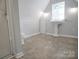 Bathroom showcasing pedestal sink, toilet and tiled floor at 108 Stockton St, Shelby, NC 28150