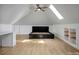 A well-lit attic bedroom featuring hardwood floors and one skylight at 108 Stockton St, Shelby, NC 28150