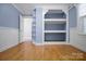 Bright bedroom features hardwood floors, built in shelving and lots of closet space at 108 Stockton St, Shelby, NC 28150
