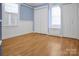 Inviting bedroom with hardwood floors, window seat, and dual closets with ample storage at 108 Stockton St, Shelby, NC 28150