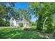 Quaint home with lush landscaping, mature trees and a well-maintained lawn at 108 Stockton St, Shelby, NC 28150