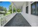 Inviting covered porch, perfect for relaxing and enjoying the neighborhood views at 108 Stockton St, Shelby, NC 28150