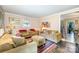 Inviting living room with cozy seating arrangement and neutral color palette at 1115 Grovewood Dr, Charlotte, NC 28208