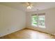 Cozy bedroom with natural light and vinyl wood flooring at 12314 Chickasaw Dr, Huntersville, NC 28078
