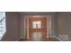 Dining room featuring hardwood floors and light fixtures at 12314 Chickasaw Dr, Huntersville, NC 28078