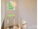 Grand foyer with a chandelier and lots of natural light at 12314 Chickasaw Dr, Huntersville, NC 28078