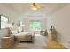 Serene bedroom featuring neutral tones, a comfortable bed, and a dresser for a relaxing retreat at 12314 Chickasaw Dr, Huntersville, NC 28078