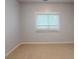 Bedroom featuring neutral paint, carpet, and a window letting in natural light at 1337 Braeburn Nw Rd, Concord, NC 28027