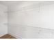 Walk-in closet with built-in shelving at 13605 Tranquil Day Dr, Matthews, NC 28105