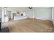 Open floor plan with a seamless transition between the kitchen and the living room at 13605 Tranquil Day Dr, Matthews, NC 28105
