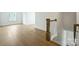 Staircase featuring wooden steps, and white and wooden banister at 13605 Tranquil Day Dr, Matthews, NC 28105