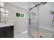 Bathroom featuring glass shower, black hardware, and vanity at 1408 Bloomsberry Ln, Waxhaw, NC 28173