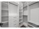 Spacious closet with custom shelving and drawers provide ample storage solutions at 1408 Bloomsberry Ln, Waxhaw, NC 28173