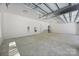 Clean and spacious garage with bright lighting and modern fixtures at 1408 Bloomsberry Ln, Waxhaw, NC 28173