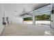 Spacious garage with high ceilings and open door to driveway at 1408 Bloomsberry Ln, Waxhaw, NC 28173