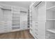 Spacious walk-in closet with custom shelving and ample storage space at 1408 Bloomsberry Ln, Waxhaw, NC 28173