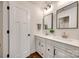 Bathroom featuring double sink vanity, white countertops, and modern fixtures at 18011 Wilbanks Dr, Charlotte, NC 28278
