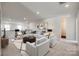 Cozy living room featuring neutral tones, comfortable seating and great natural light at 18011 Wilbanks Dr, Charlotte, NC 28278