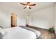 Spacious main bedroom with stylish decor, wood-look floors and multiple entryways at 18011 Wilbanks Dr, Charlotte, NC 28278