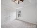 Bright bedroom with a ceiling fan and plenty of natural light from window at 2020 White Cedar Ln, Waxhaw, NC 28173