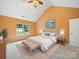 Serene primary bedroom featuring a vaulted ceiling, plush carpet, and a comfortable king bed at 2020 White Cedar Ln, Waxhaw, NC 28173