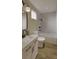 Well-lit bathroom featuring a vanity with a modern sink, and a shower-tub combination at 2432 Arty Ave, Charlotte, NC 28208