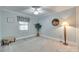 Neutral bedroom features cozy carpet, window with blinds, ceiling fan and ample space at 2915 Cherry Blossom Ct, Fort Mill, SC 29715