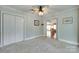 Bedroom features carpet, light walls, closet and view to other rooms at 2915 Cherry Blossom Ct, Fort Mill, SC 29715