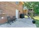 This backyard has a patio with a grill and outdoor furniture at 3400 Barfield Dr, Charlotte, NC 28217