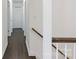 Hallway with dark wood flooring and staircase at 3400 Barfield Dr, Charlotte, NC 28217