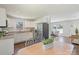 Modern kitchen with white cabinets, granite countertops, and stainless steel appliances at 3400 Barfield Dr, Charlotte, NC 28217