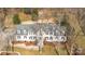 Aerial view showcasing the home's stately presence and beautiful landscaping on a large lot at 4001 Carmel Acres Dr, Charlotte, NC 28226