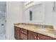 Bathroom featuring dual sinks, granite countertops, and modern lighting at 4001 Carmel Acres Dr, Charlotte, NC 28226