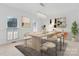 Dining room with modern chandelier, neutral walls, and large windows at 4001 Carmel Acres Dr, Charlotte, NC 28226