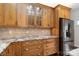 Kitchen featuring stylish countertops and stainless steel refrigerator at 4001 Carmel Acres Dr, Charlotte, NC 28226