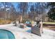 Outdoor patio with comfortable seating, ideal for relaxing and enjoying the serene surroundings at 4001 Carmel Acres Dr, Charlotte, NC 28226