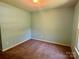 Bedroom with neutral paint and carpet, providing a blank canvas for personalization at 401 Overlook Dr, Monroe, NC 28110